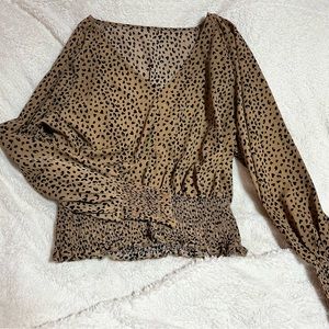 A dainty, cute cheetah print top!